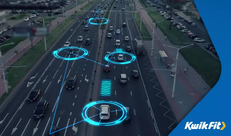 Cars driving on a motorway with concept highlights to indicate that they're aware of each other and communicating.