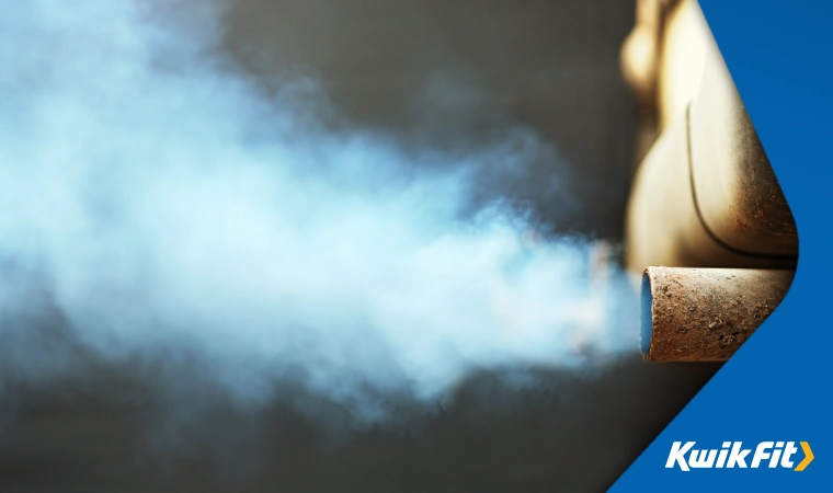 Blue-grey smoke coming out of a car's exhaust, indicating oil being burned at some point in the line.