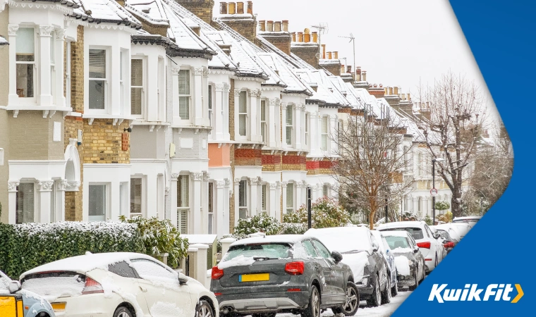 Cars remain parked on a Victorian street in West Hampstead, London, after heavy snowfall & icy conditions.