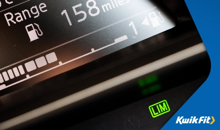 Car dashboard showing the car's speed limiter engaged.