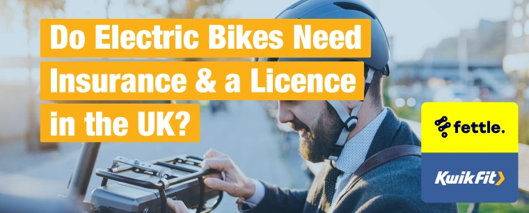 Man in a suit with a bike helmet on adjusting the seat of a bike.